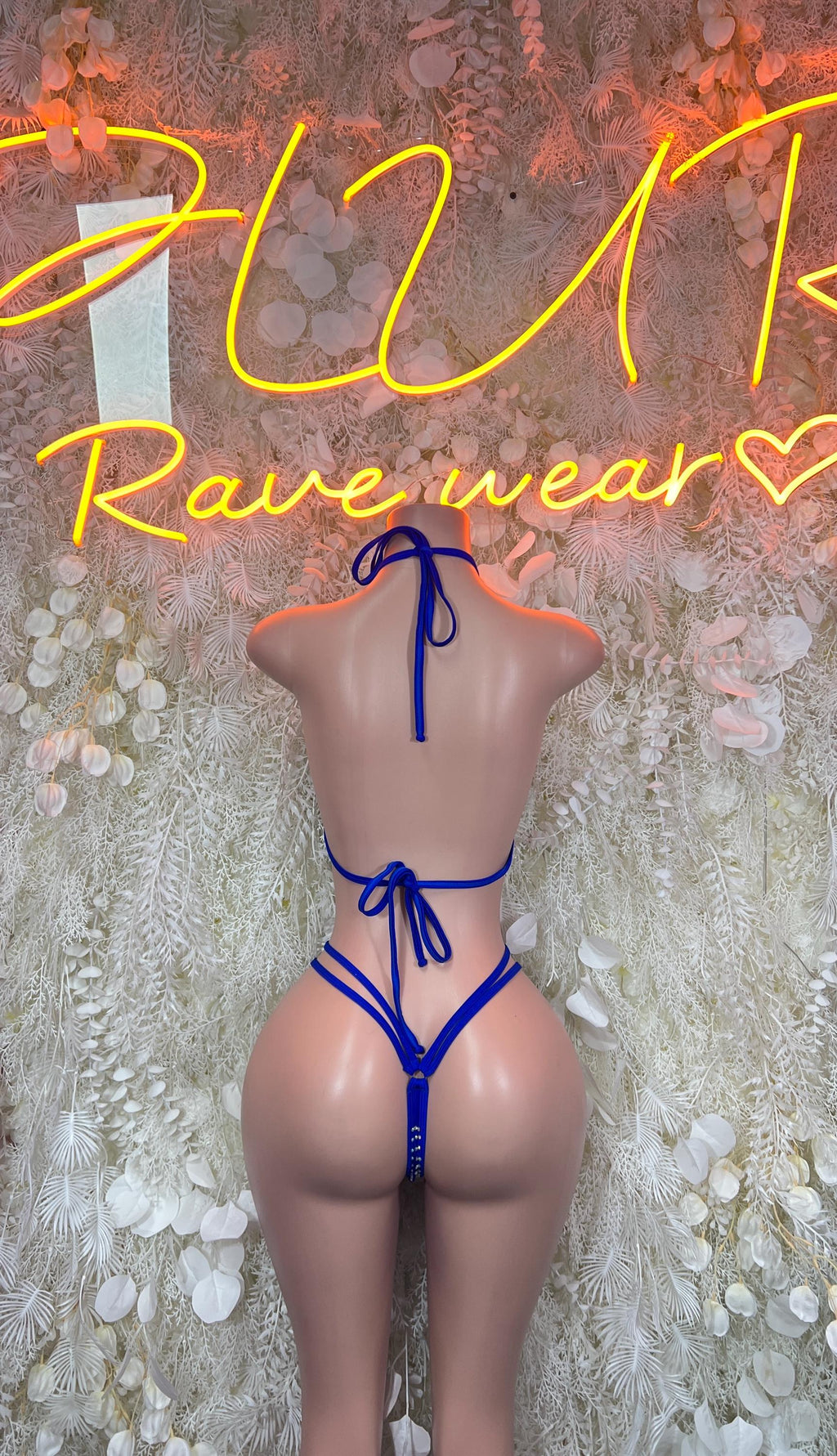 Blue rhinestone bikini set with tie-back strings and matching thong bottoms, back view