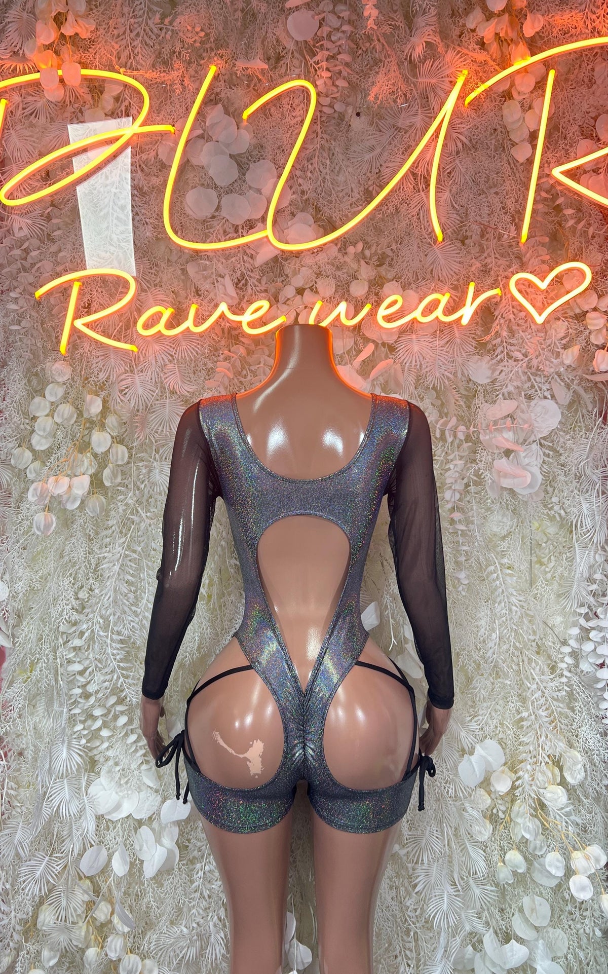 Silver metallic sheer long-sleeve bodysuit with front keyhole cutout and leg openings