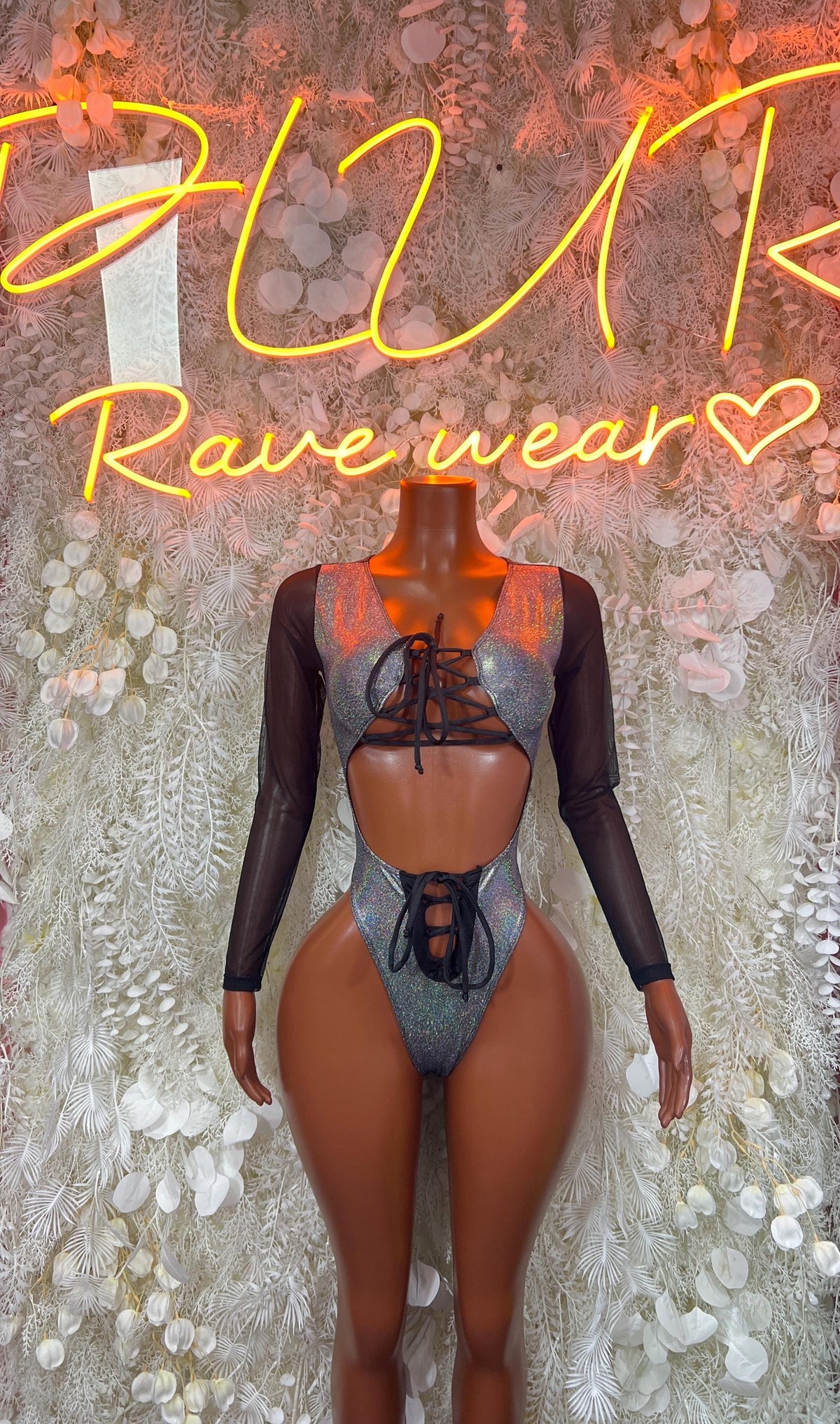 Silver metallic lace-up long-sleeve bodysuit with crisscross front cutout and high leg