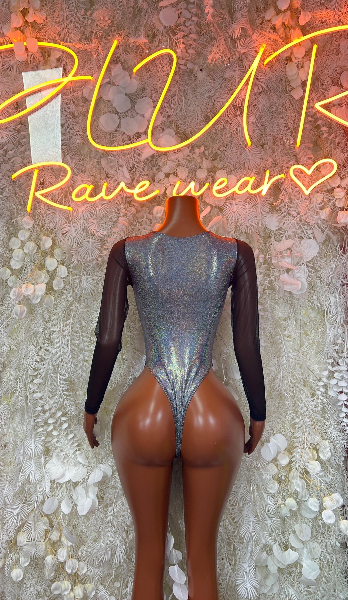 Silver metallic long-sleeve bodysuit with deep back V and high-cut bottom