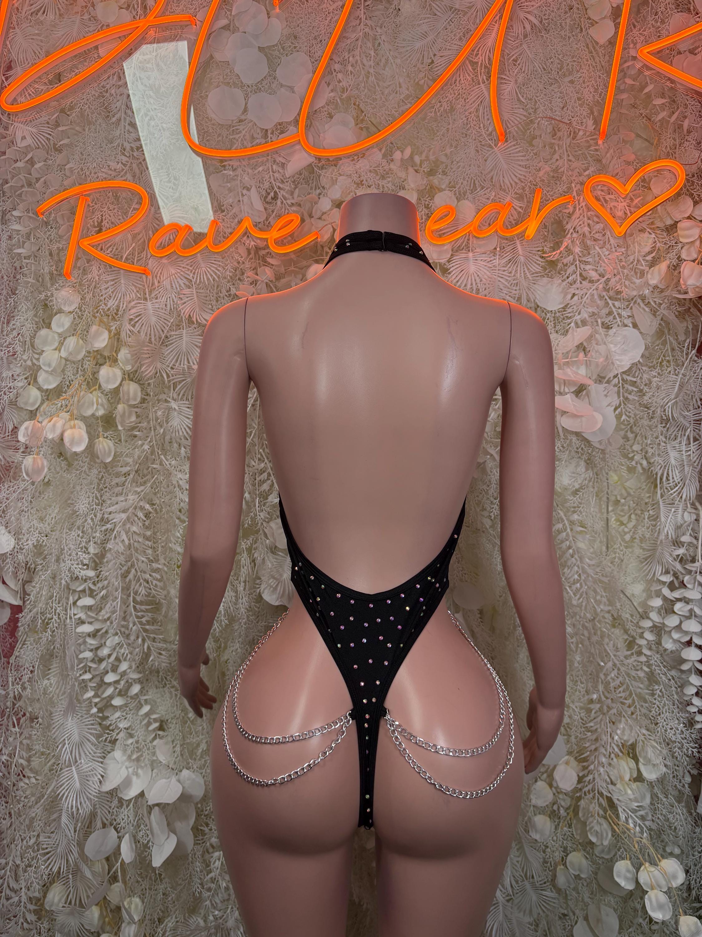 Black fishnet rhinestone bodysuit with open back and chain waist straps