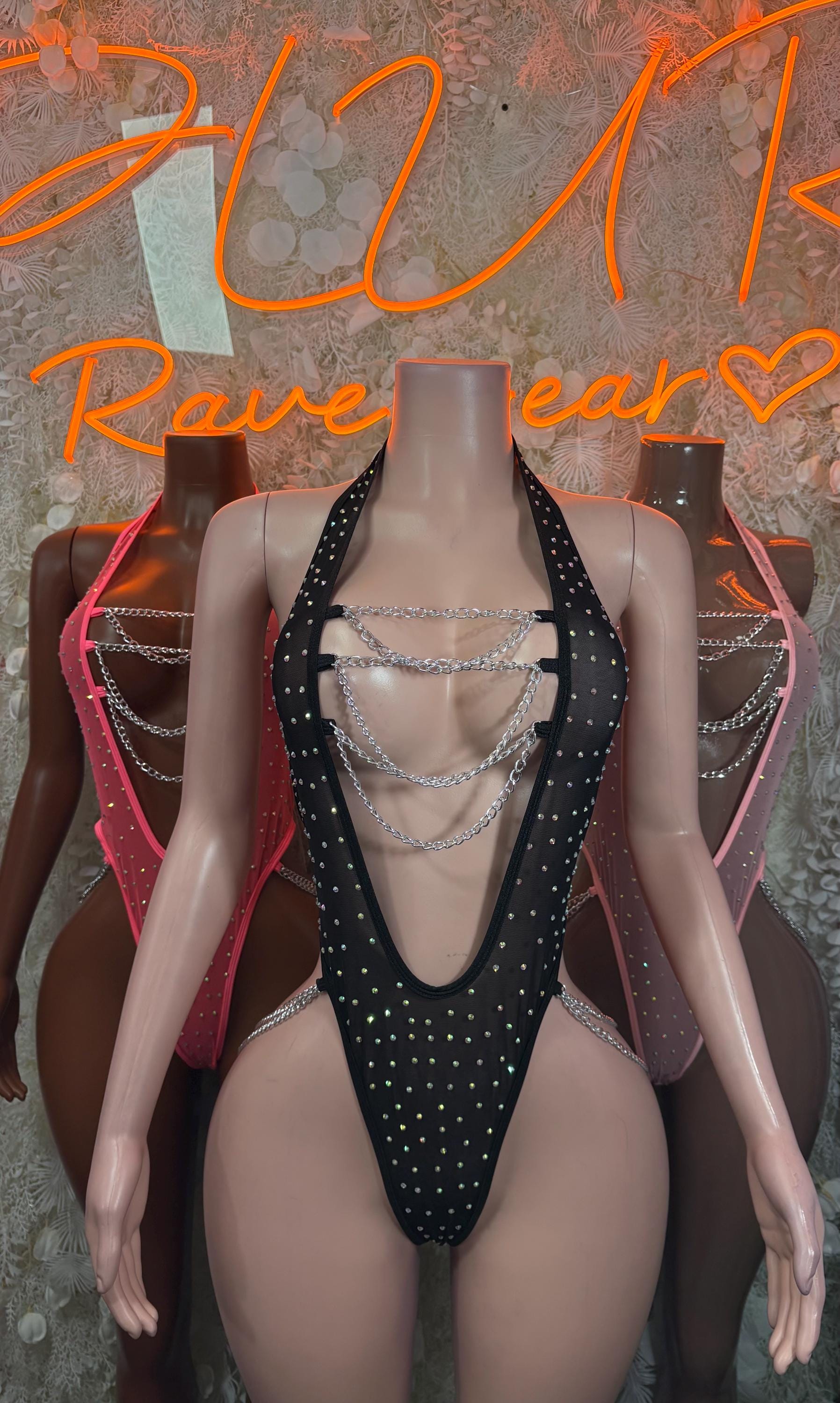 Black bodysuit with silver chain harness and rhinestone-studded straps, front view