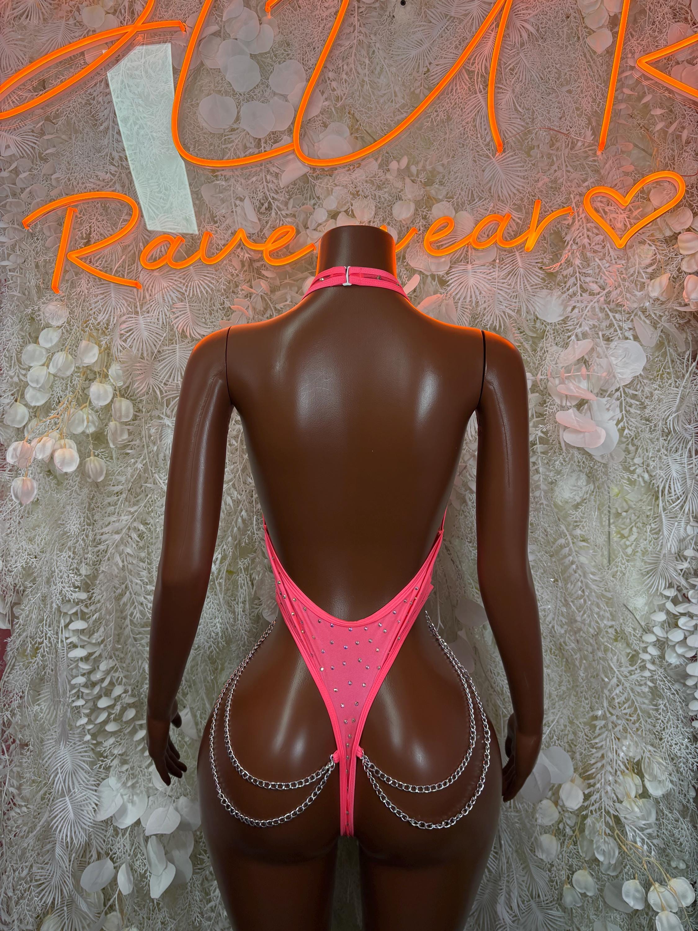 Coral bodysuit with open back, silver chain straps, rhinestone details