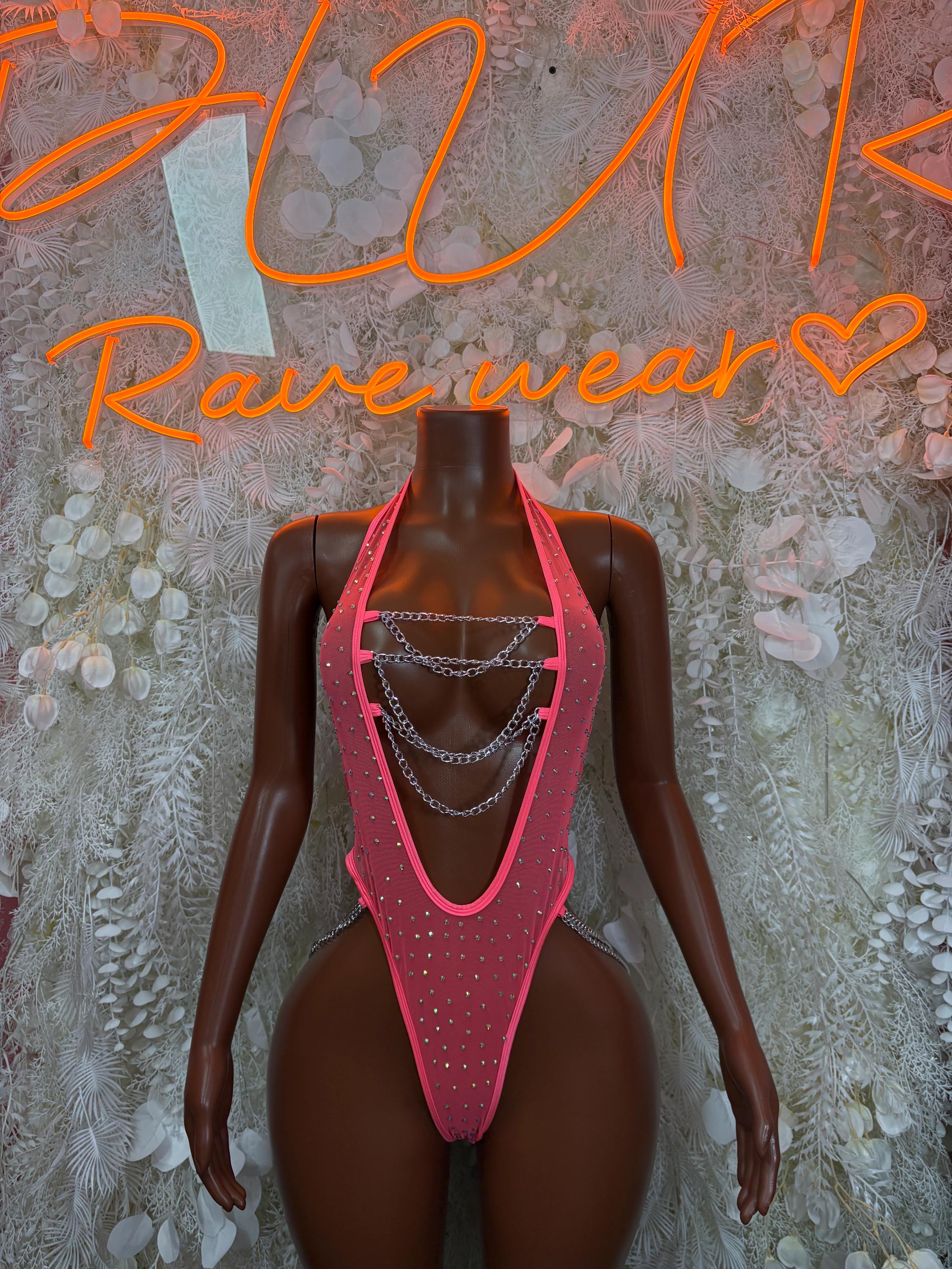 Coral bodysuit with silver chain harness and rhinestone trim, front view