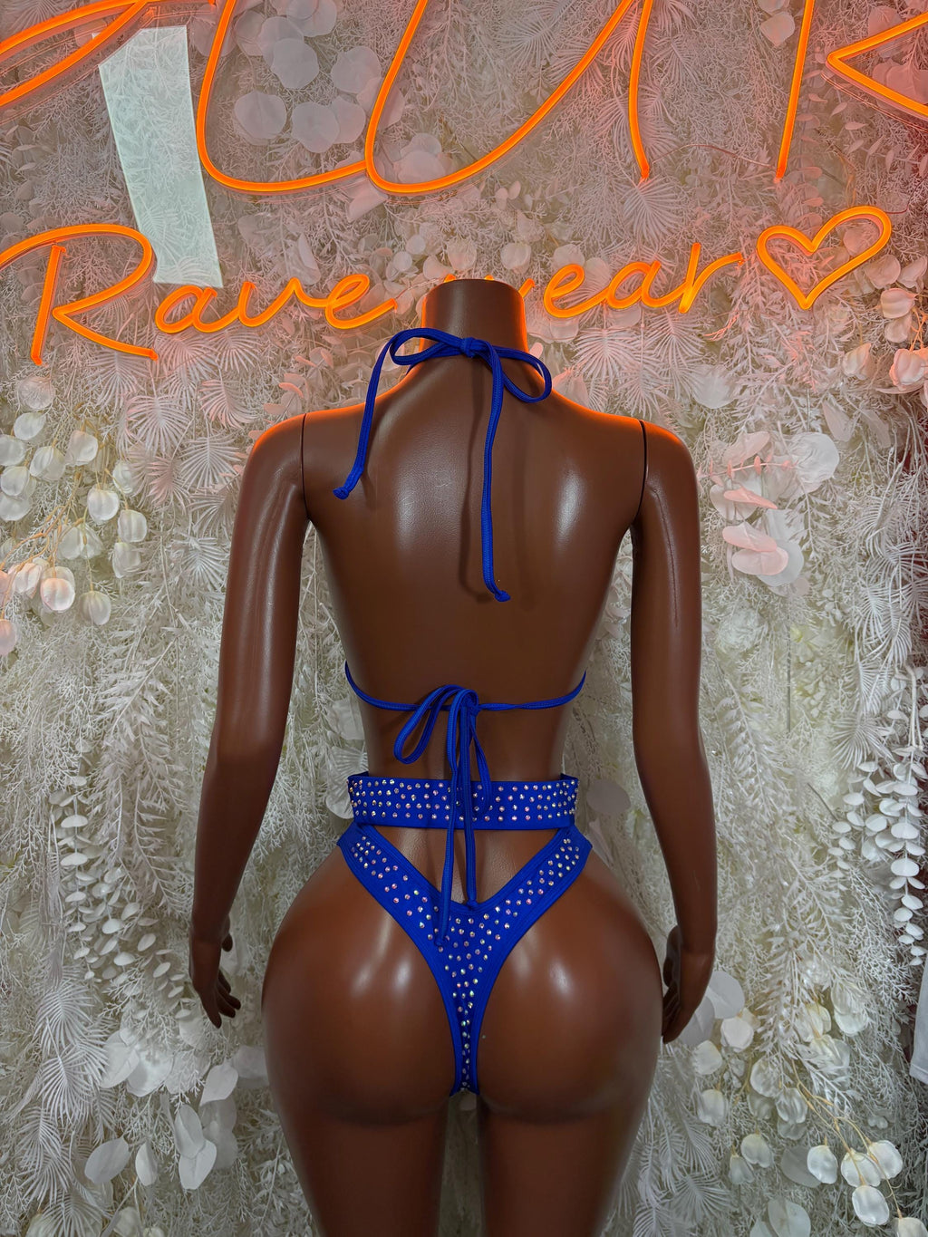 Blue rhinestone two-piece bikini with tie-back halter top and high-cut bottom