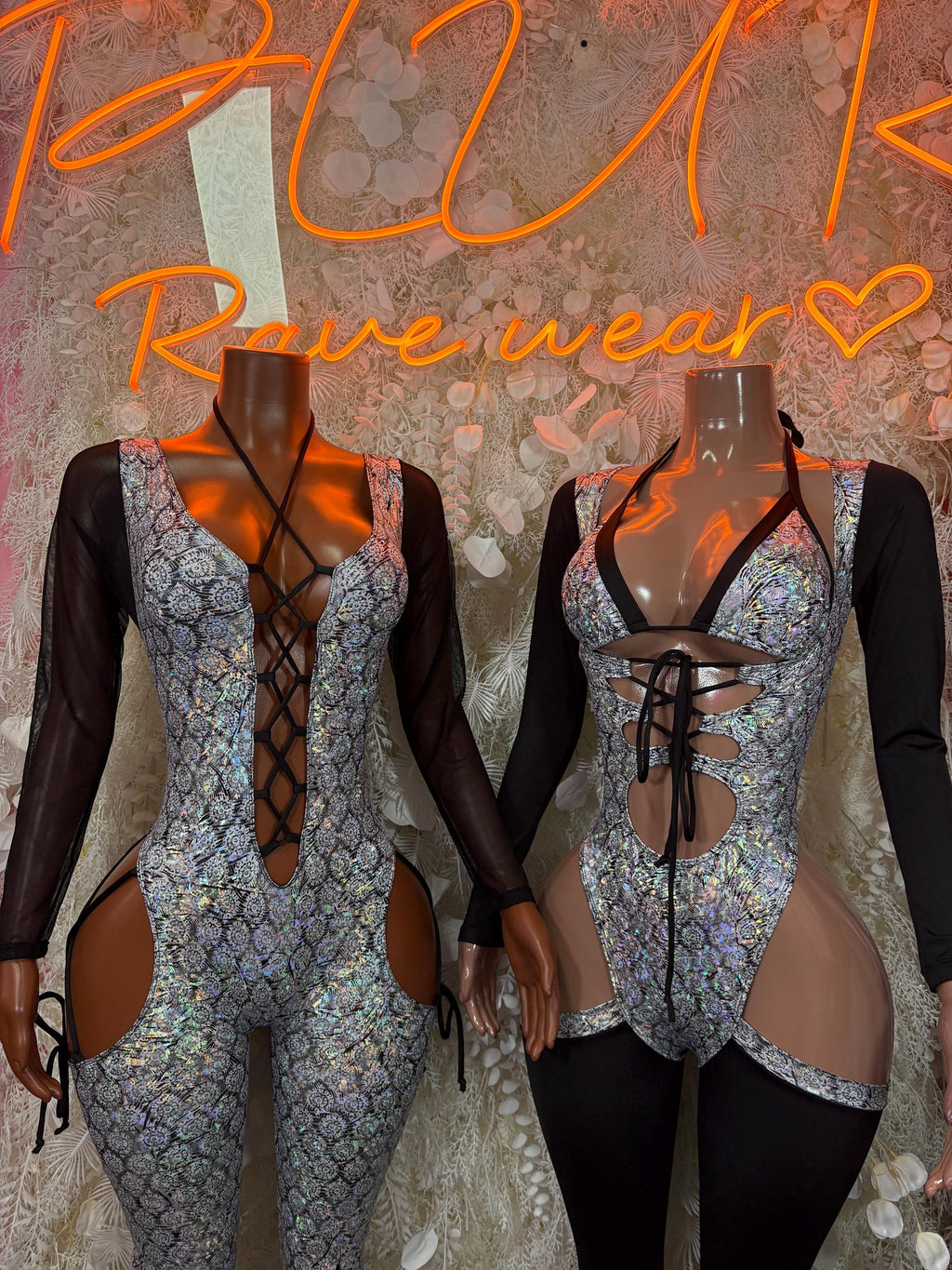 Metallic silver-blue bodysuit shown front and back, with black sheer sleeves