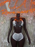 White rhinestone bikini top and high-waist bottoms, halter straps and lace-up sides