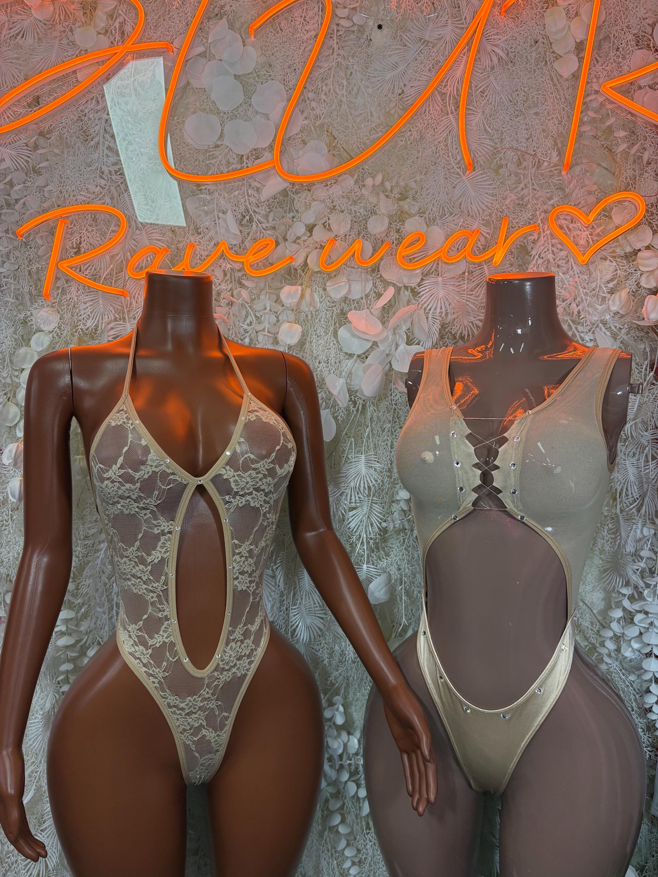 Tan lace bodysuit with halter-style straps and V chest cutout