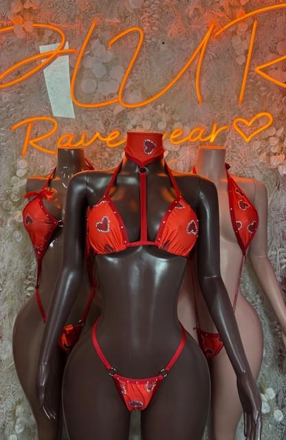 Red lingerie set on mannequin, triangle bra and matching thong