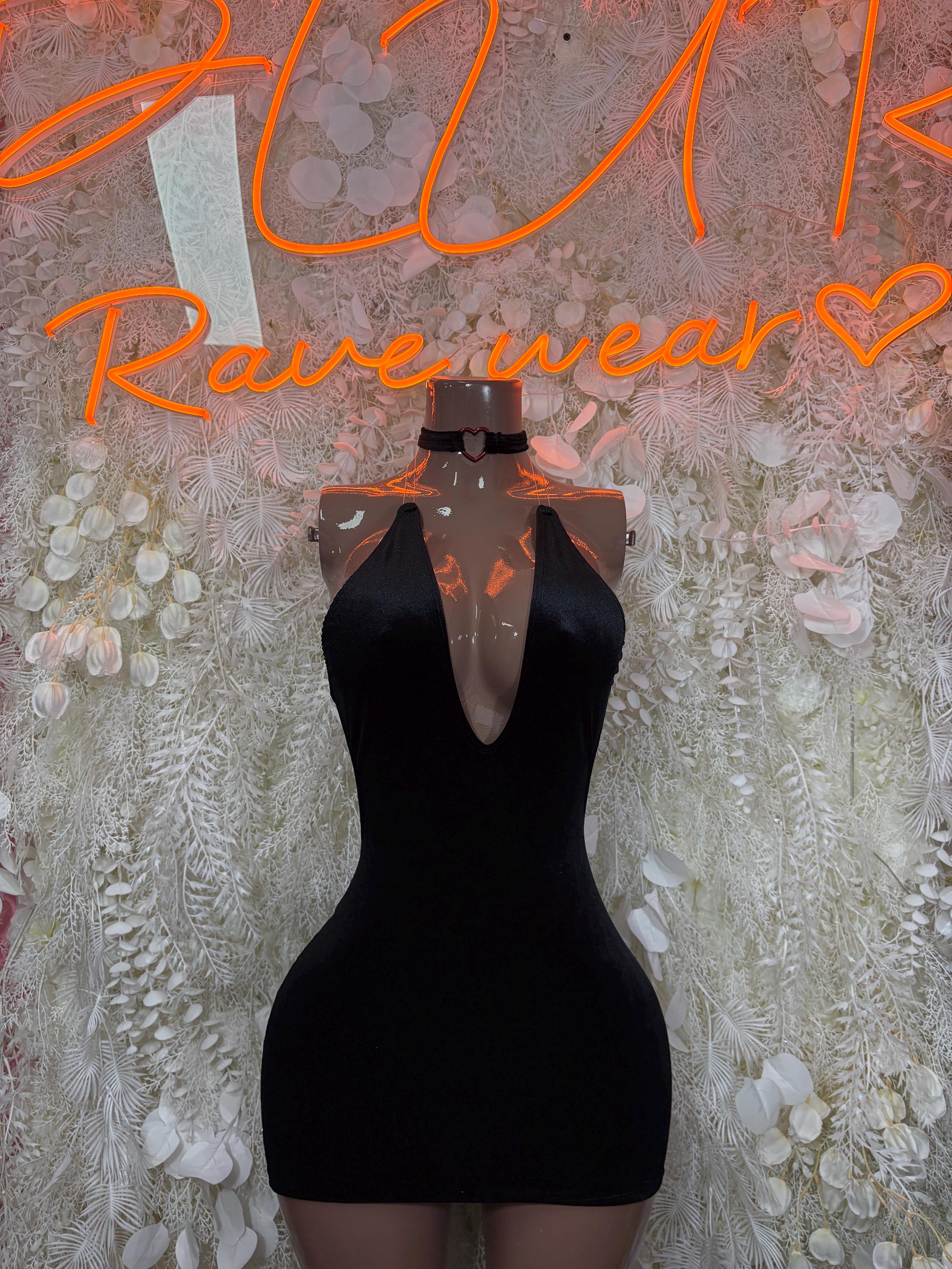 Black mini dress with choker-style neckline and V-shaped front cutout