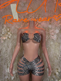 Snake-print rave two-piece set with underwire bra and high-waist shorts, front view