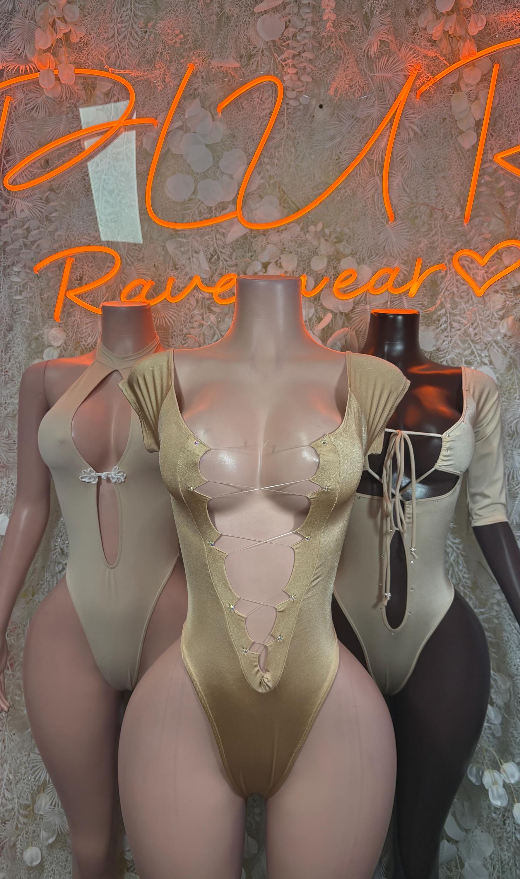 Tan lace-up bodysuit with low neckline and ruched cups