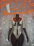 Tan long-sleeve bodysuit with lace-up front and thong-style bottom