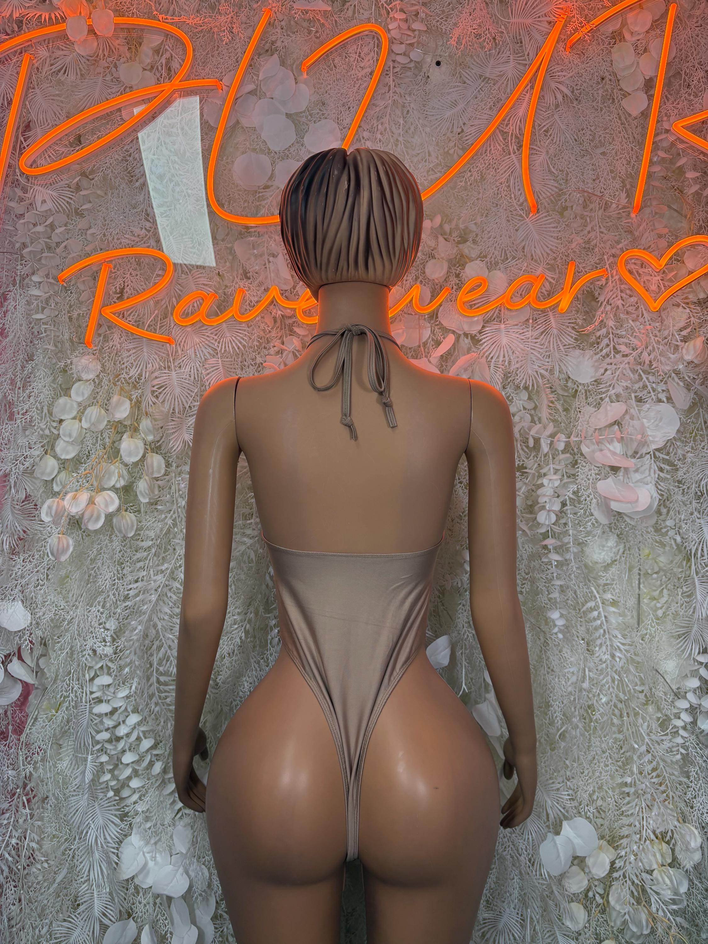 Nude one-piece dance bodysuit, open back with tied halter straps