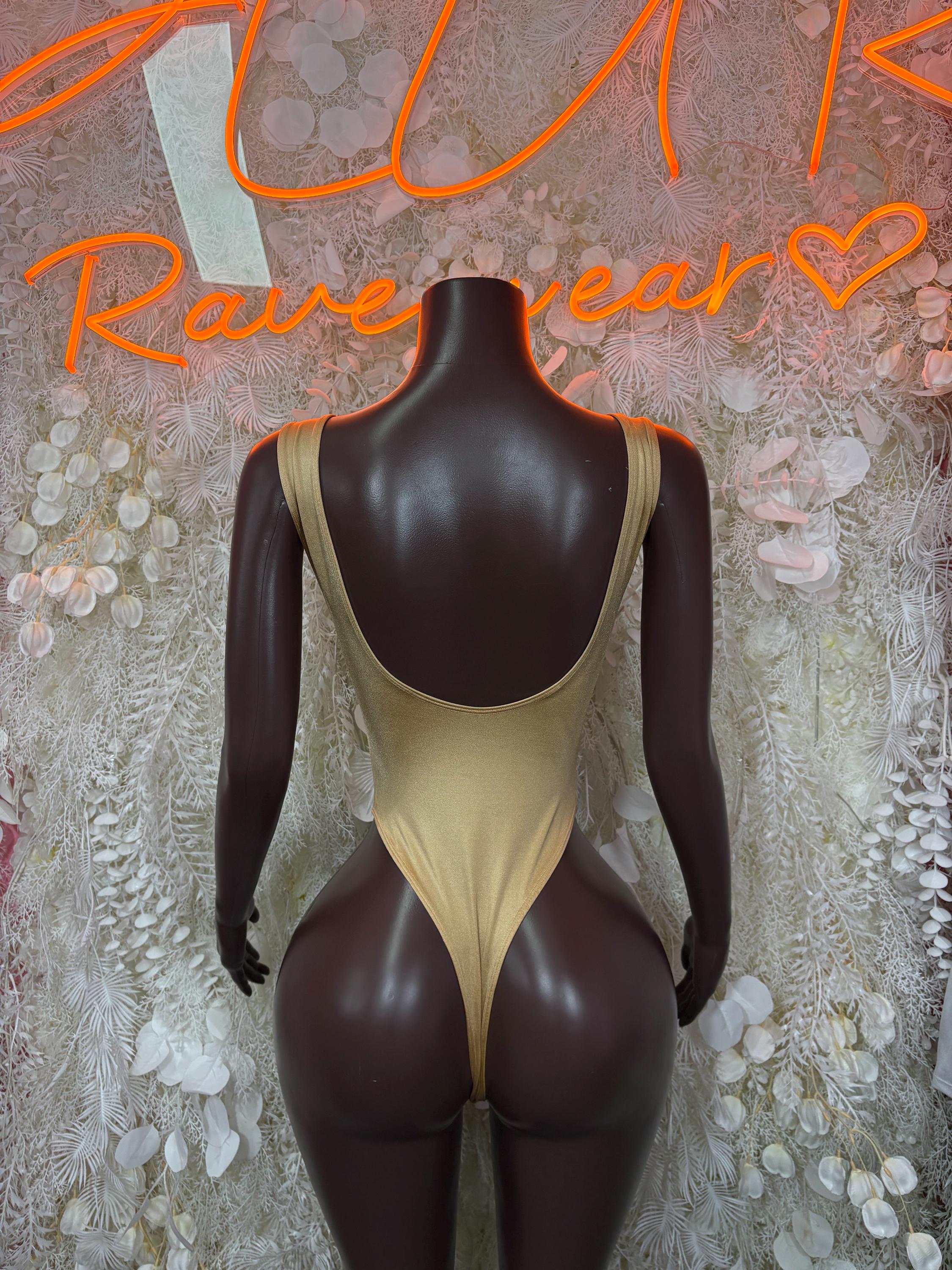 Gold one-piece bodysuit with scoop back and thin shoulder straps