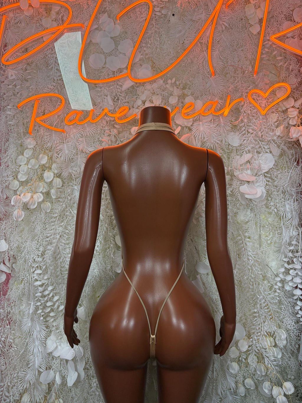 Tan halter sequin bodysuit with open back and thin string straps, back view