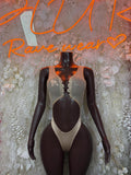 Cream tank bodysuit with oval cutouts and high-coverage legs