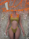 Gold metallic one-piece bodysuit with high-cut leg and scoop front
