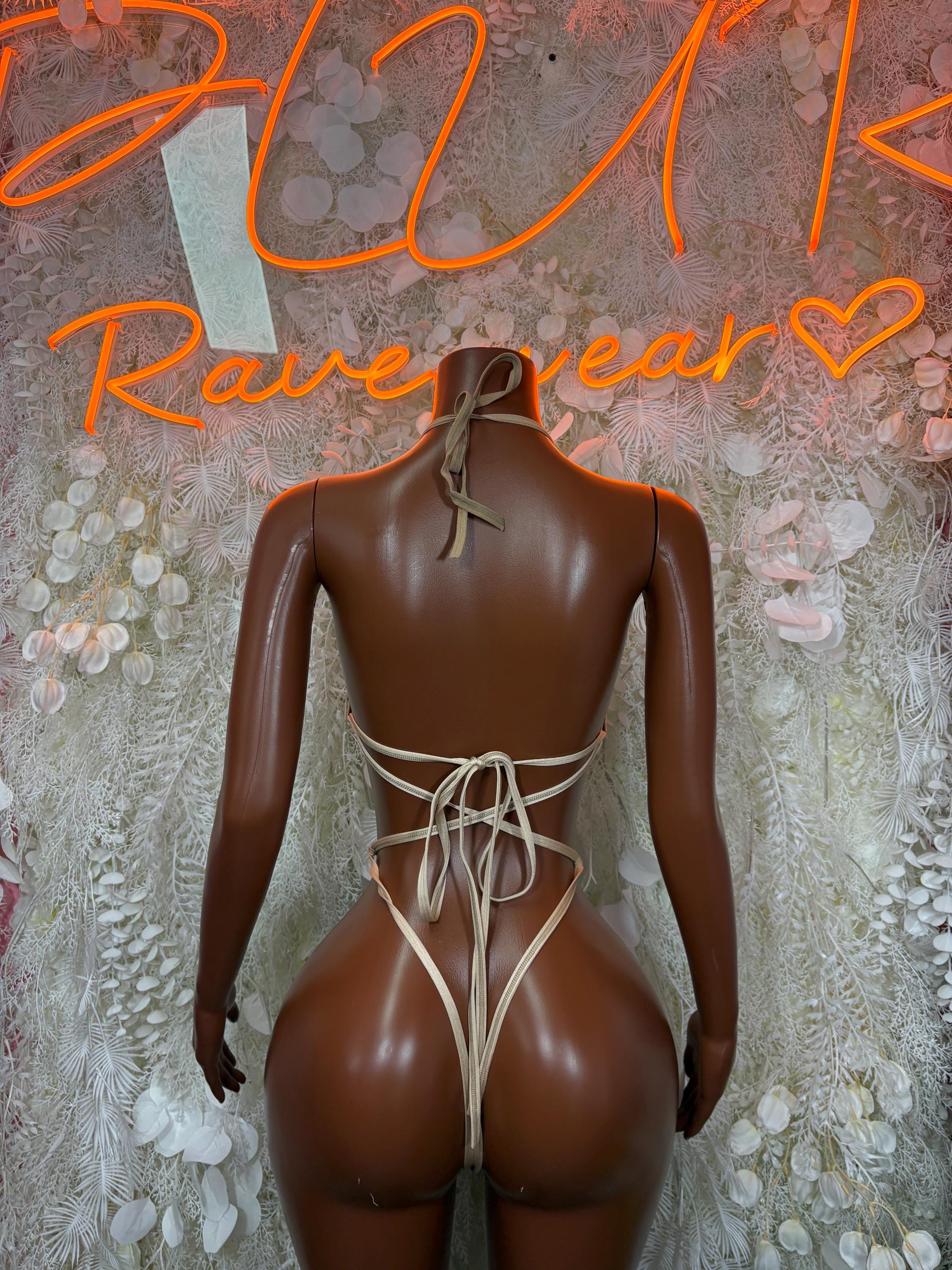 Back-tie cutout one-piece bodysuit with lace-up straps and high-leg