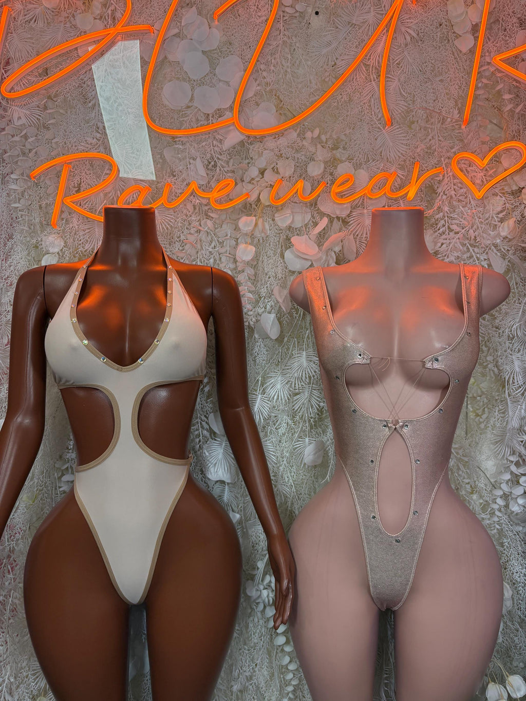 Pair of cutout one-piece bodysuits, cream front and nude studded back