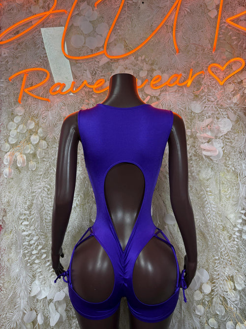Purple one-piece dance bodysuit with backless open panels and lace-up straps