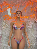 Star-and-stripe triangle bikini with red ties and high-cut matching bottoms