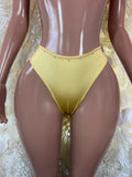 Women's metallic yellow thong-style underwear shorts with wide waistband and V-front