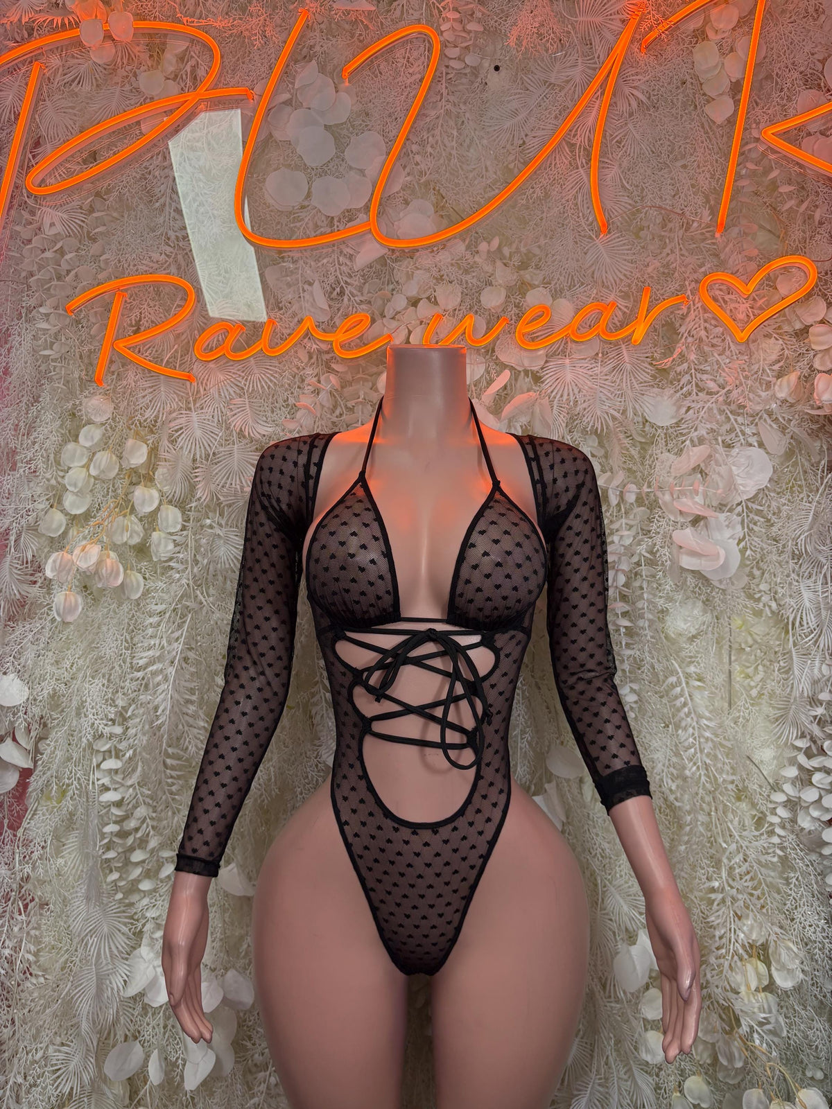 Bottlegirl heart mesh bodysuit in black with lace-up front and long sheer sleeves
