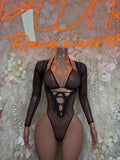 Black heart-pattern mesh bodysuit with long sleeves and lace-up front neckline