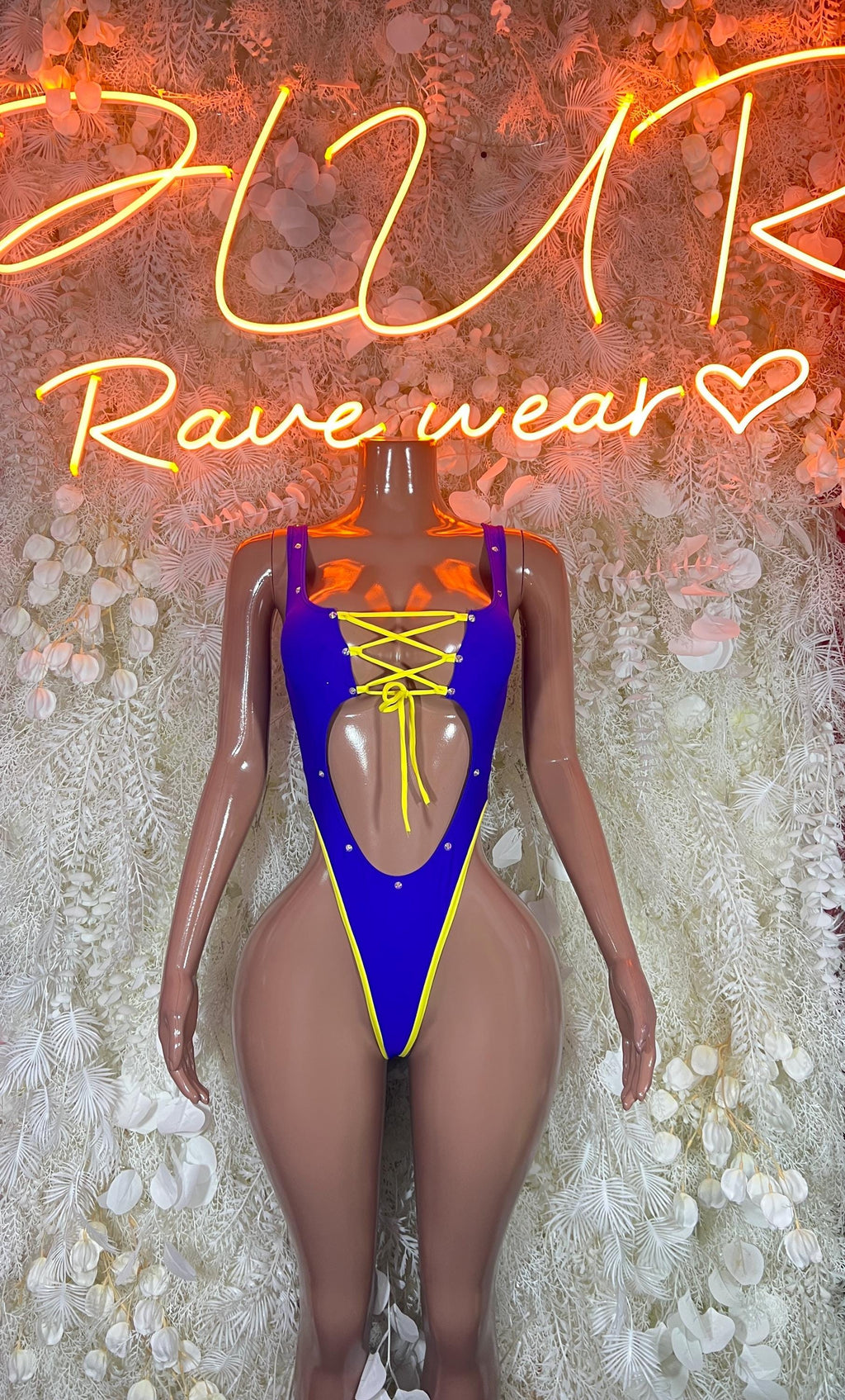 Purple and gold mesh lace-up dance bodysuit with cutout chest, thong front