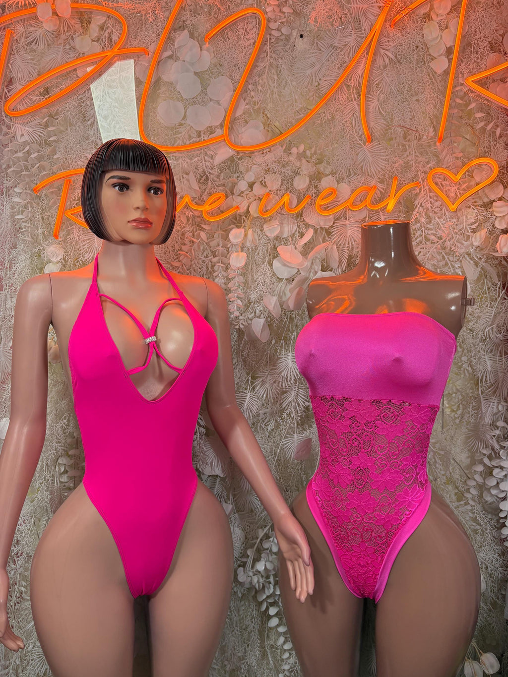 Hot pink halter bodysuit with chest cutout; front and back side-by-side view.