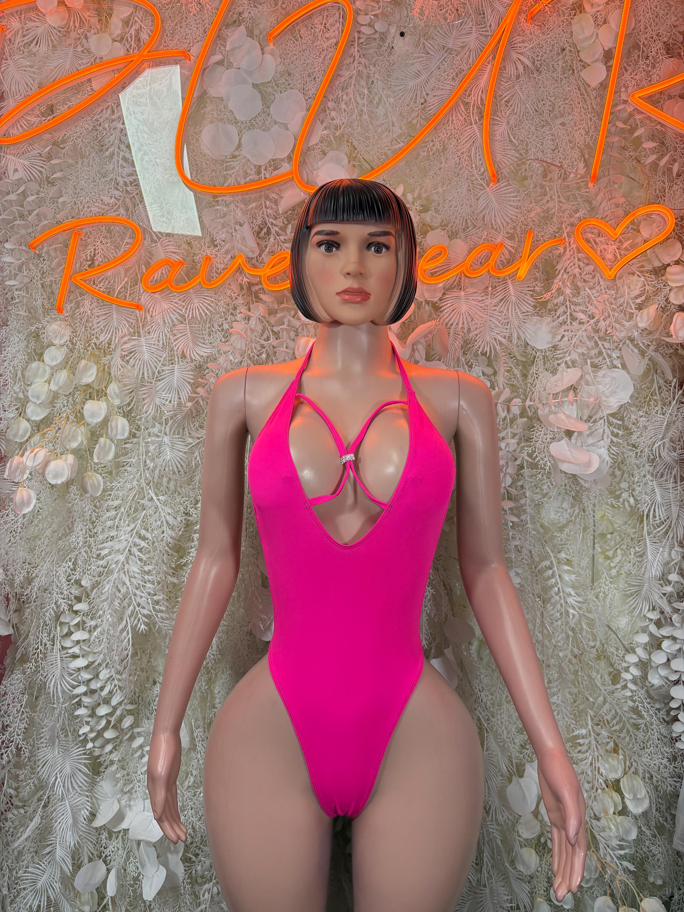 Hot pink halter bodysuit with chest cutout and thong-style bottom.