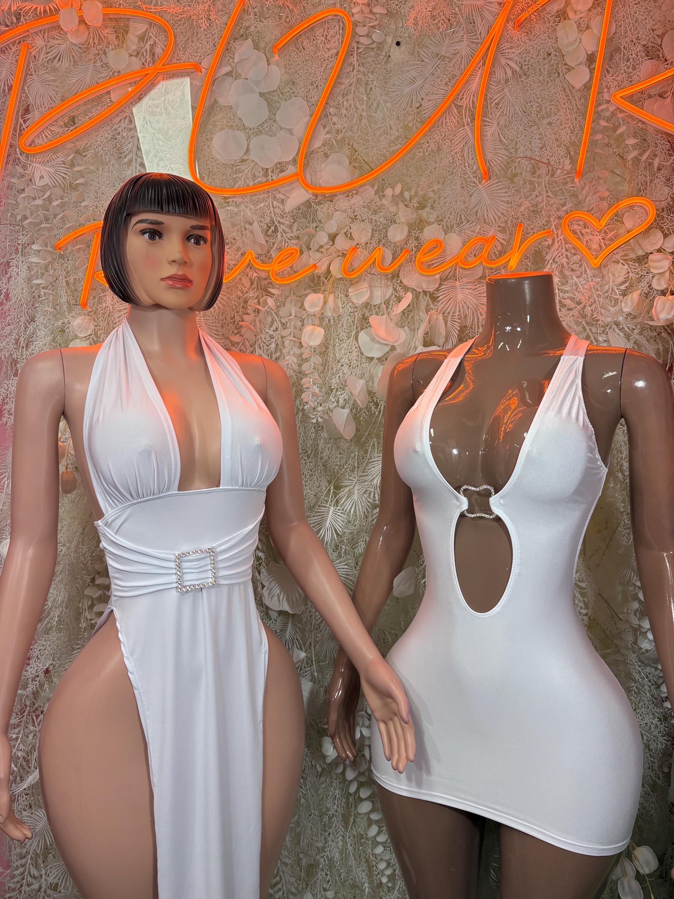 White halter mini dress on mannequin with deep V front and ruched waist belt