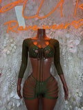Green rave two-piece: lace-up cutout crop top, long sleeves, strappy shorts
