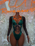 Green cheetah bodysuit with black mesh sleeves and lace-up front