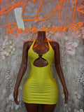 Neon yellow cutout halter dress with crisscross chest and ruched bodycon fit