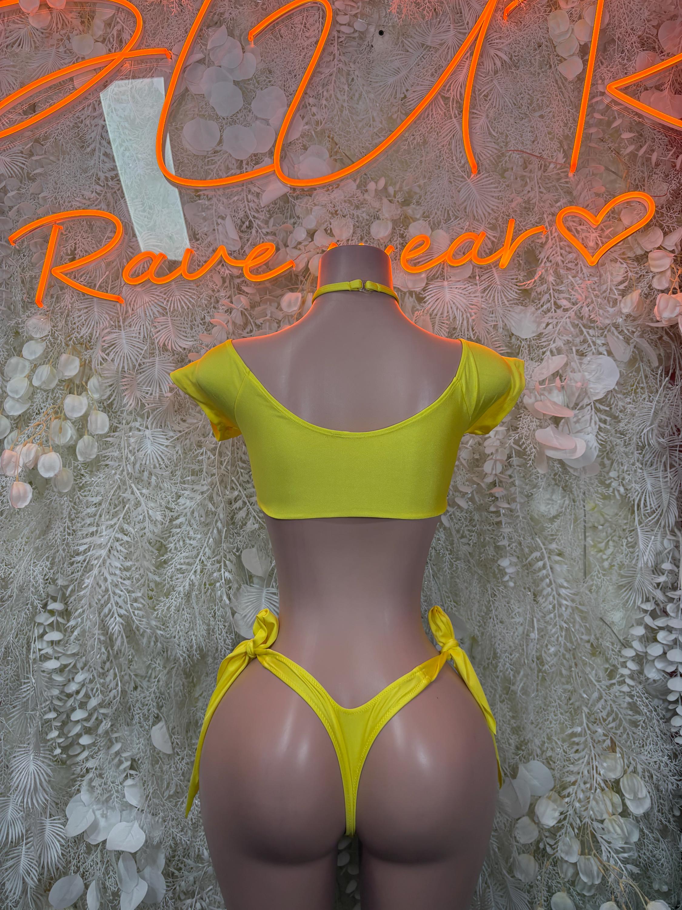 Back view: lime yellow ruched crop top with open back and tie-side string bikini bottoms