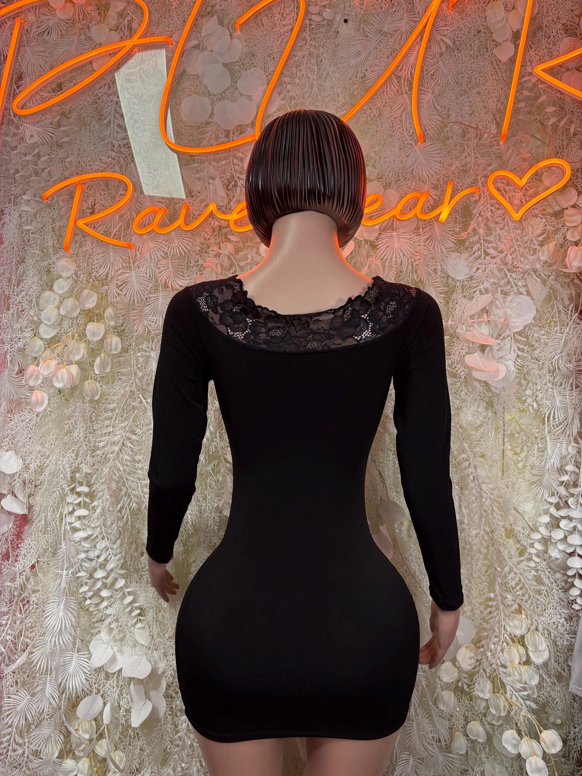 Black back view of bodycon dance dress with lace yoke and long sleeves