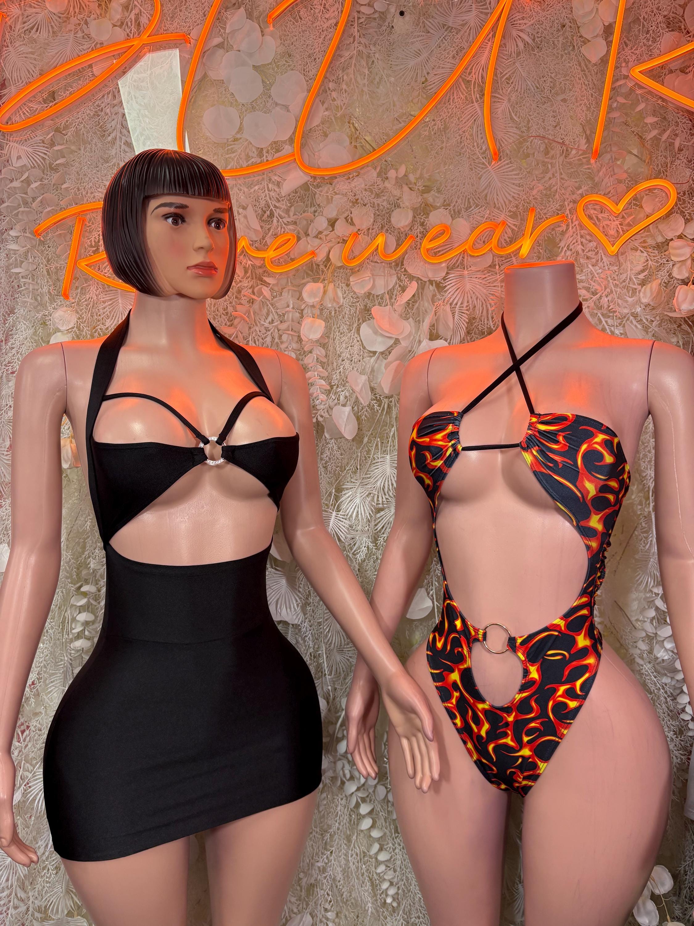 Flame-print rave bodysuit with black straps, paired with black cutout dress