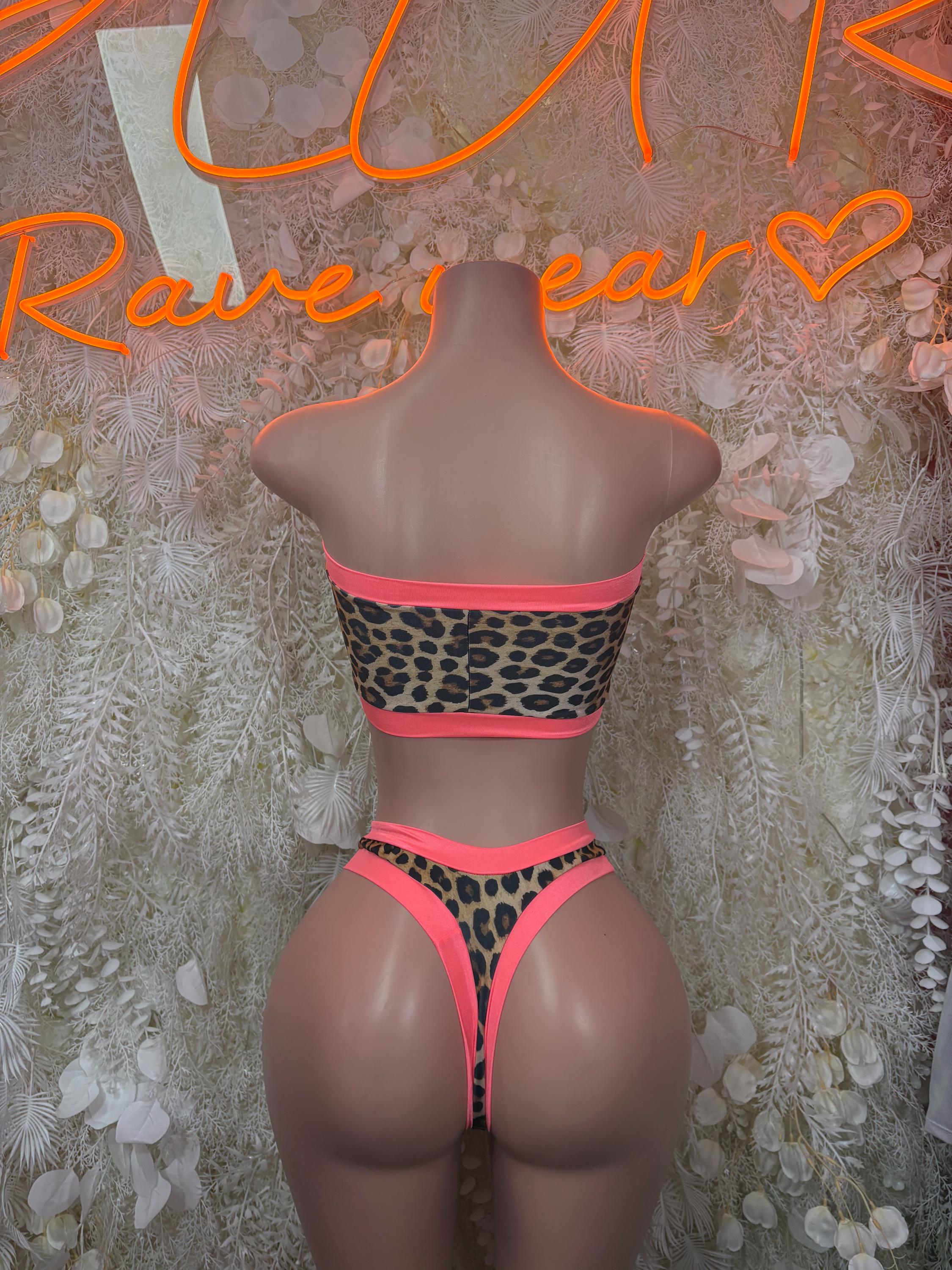 Coral leopard-print bodysuit with halter back and ring detail, high-cut bottoms