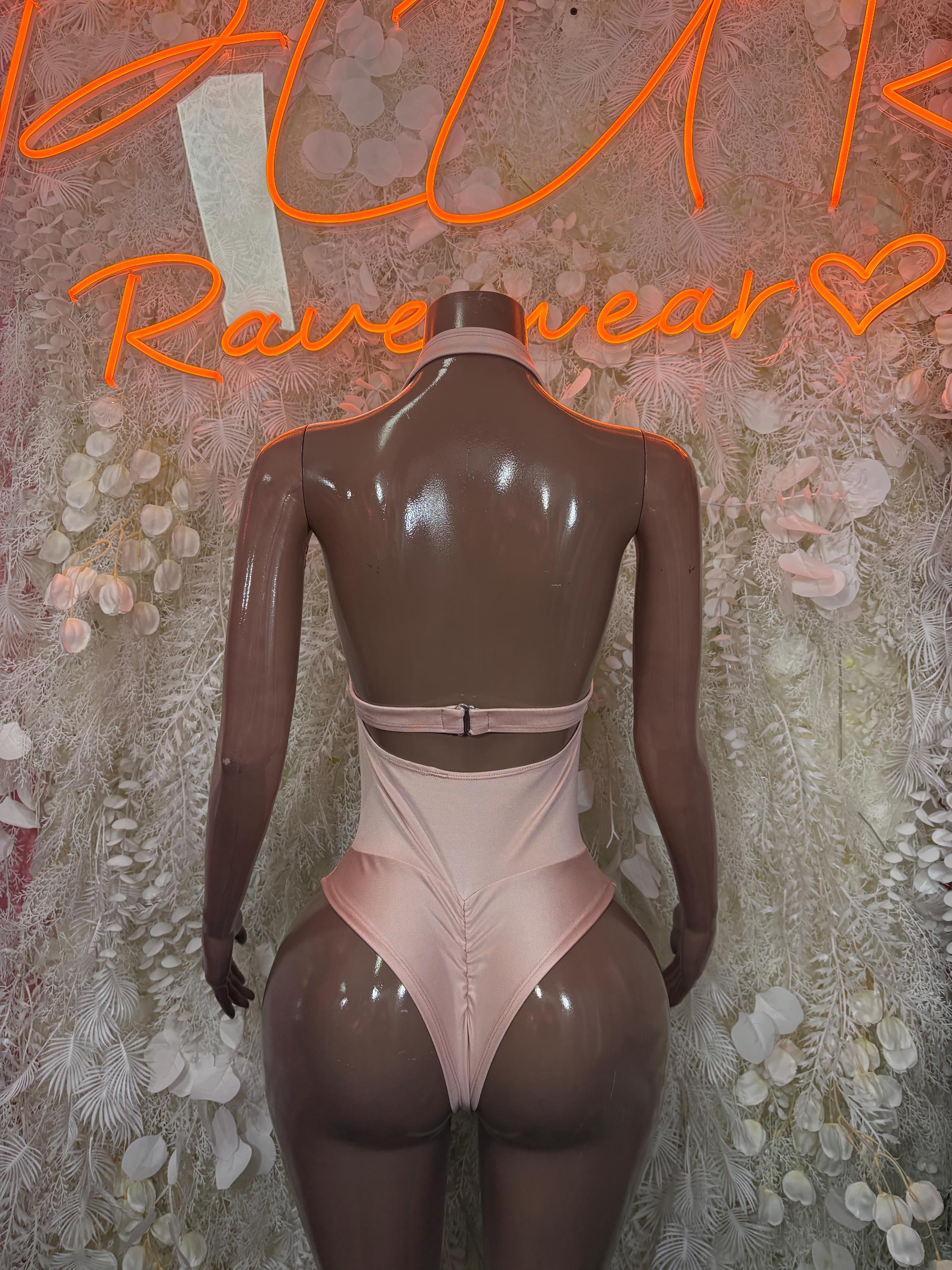 Nude bodysuit back with lace waistband and thin strap-like cutouts