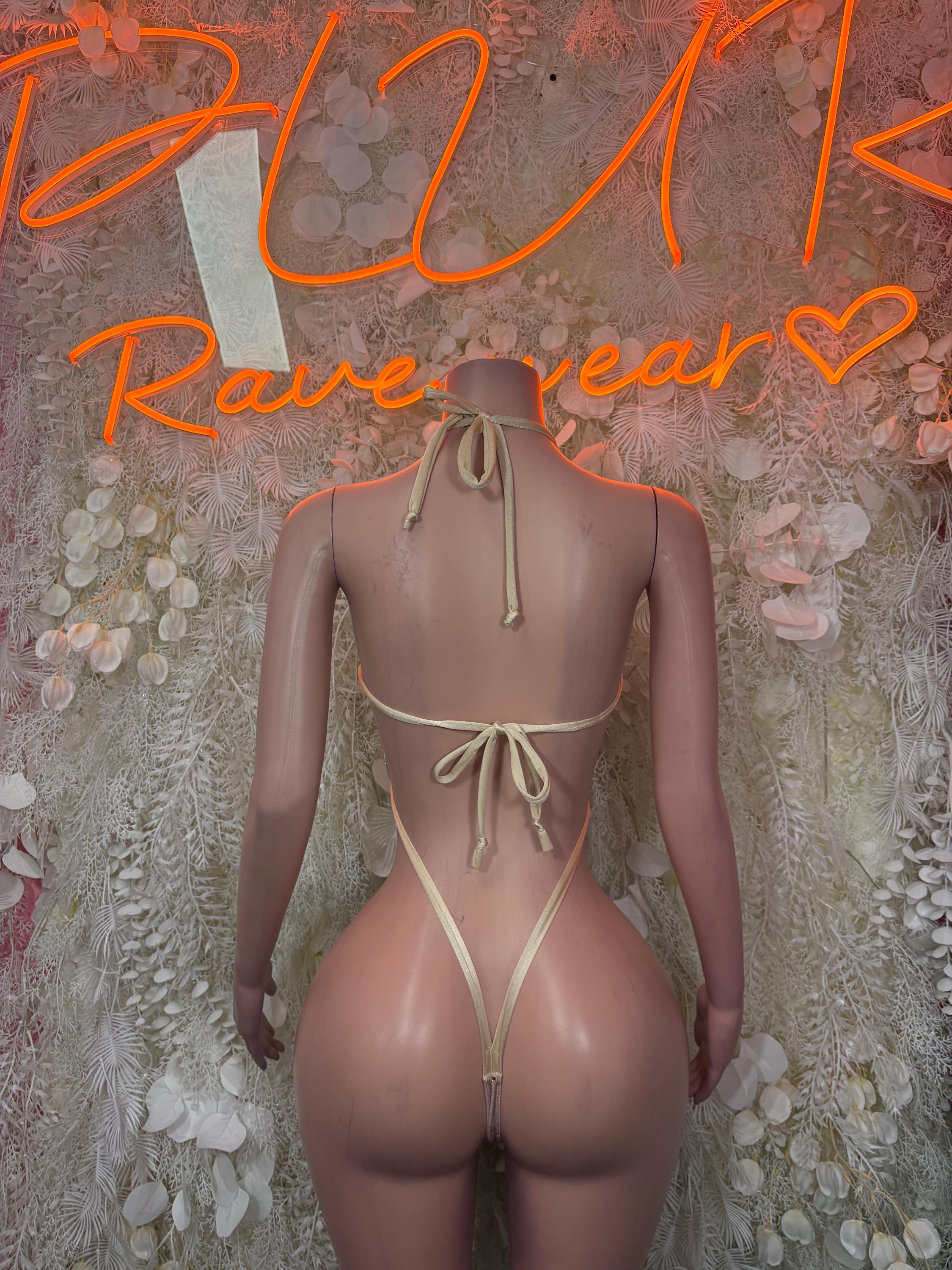 Nude string one-piece dancewear bodysuit with tied halter backless design