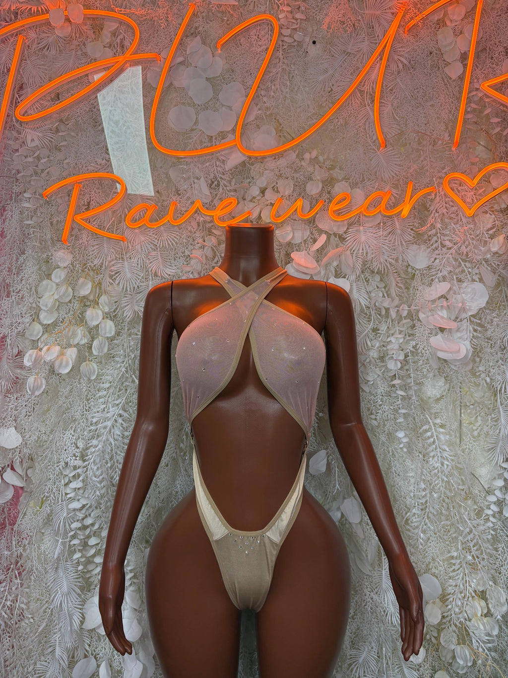 Nude sheer dance bodysuit with high neckline and crisscross cutout back