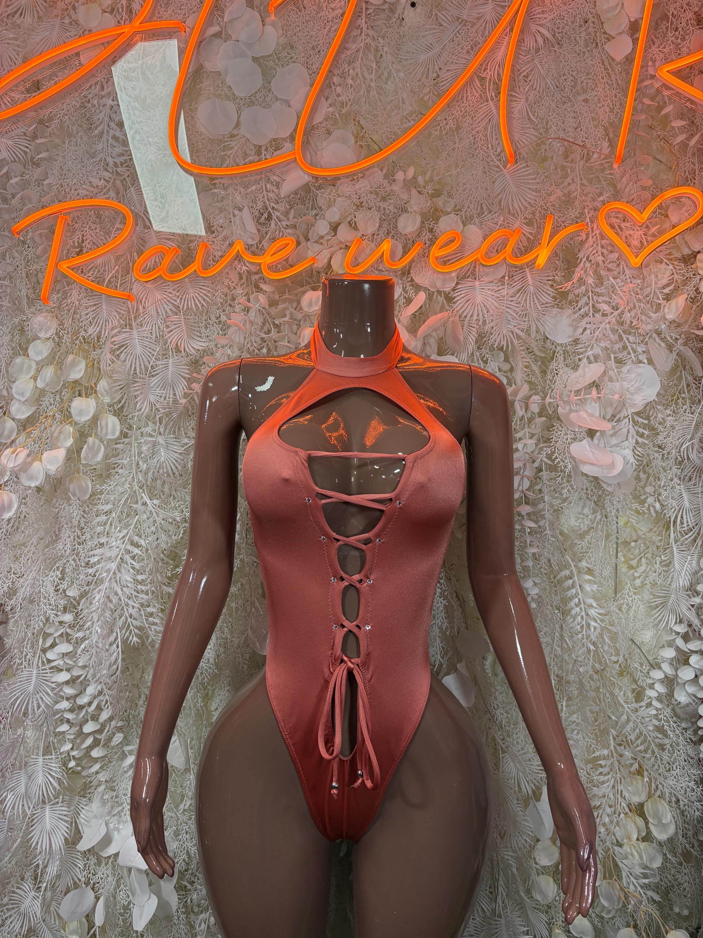 Brown lace-up halter bodysuit with keyhole cutout and thong bottom