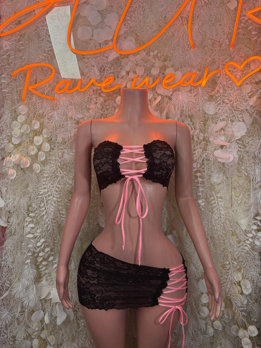 Black lace mini dress with underwire bra, ribbon ties, and matching lace skirt