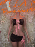 Black lace mini dress with underwire bra, ribbon ties, and matching lace skirt
