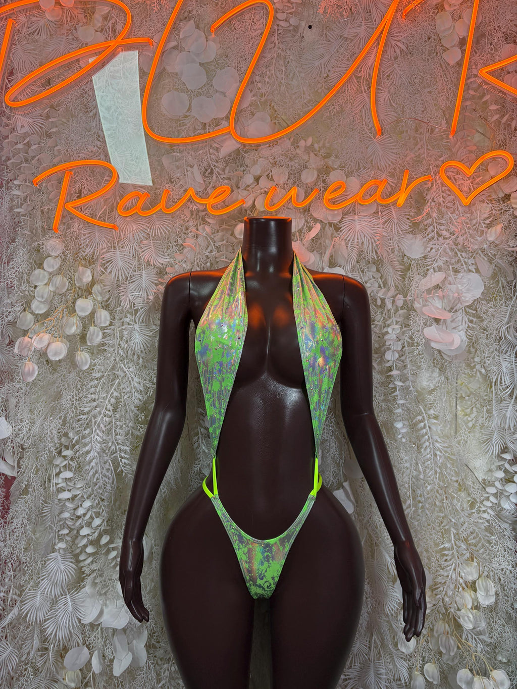 Green metallic rave bodysuit with neon green trim and halter neckline front view