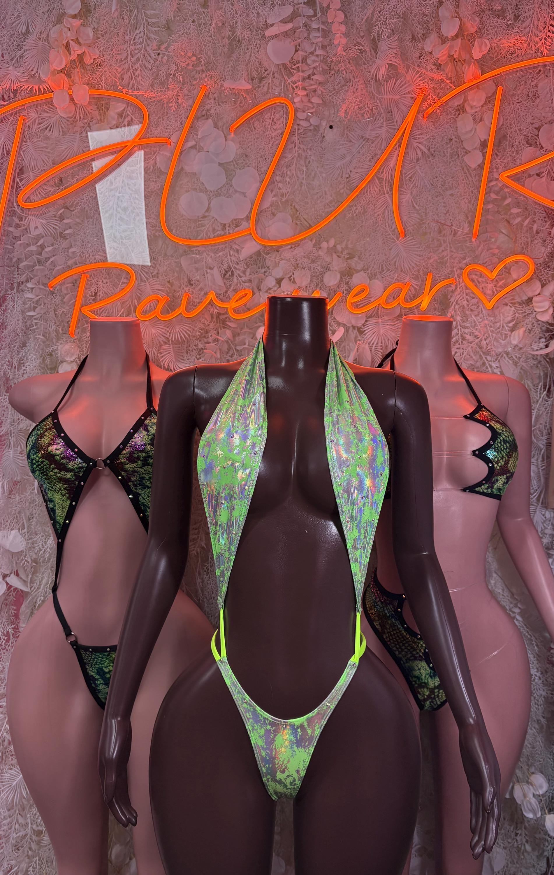 Two-piece bikini with iridescent green triangle top and bottoms, black strap ties
