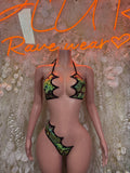 Two-piece bikini with green snake-print triangle top and matching thong with black trim
