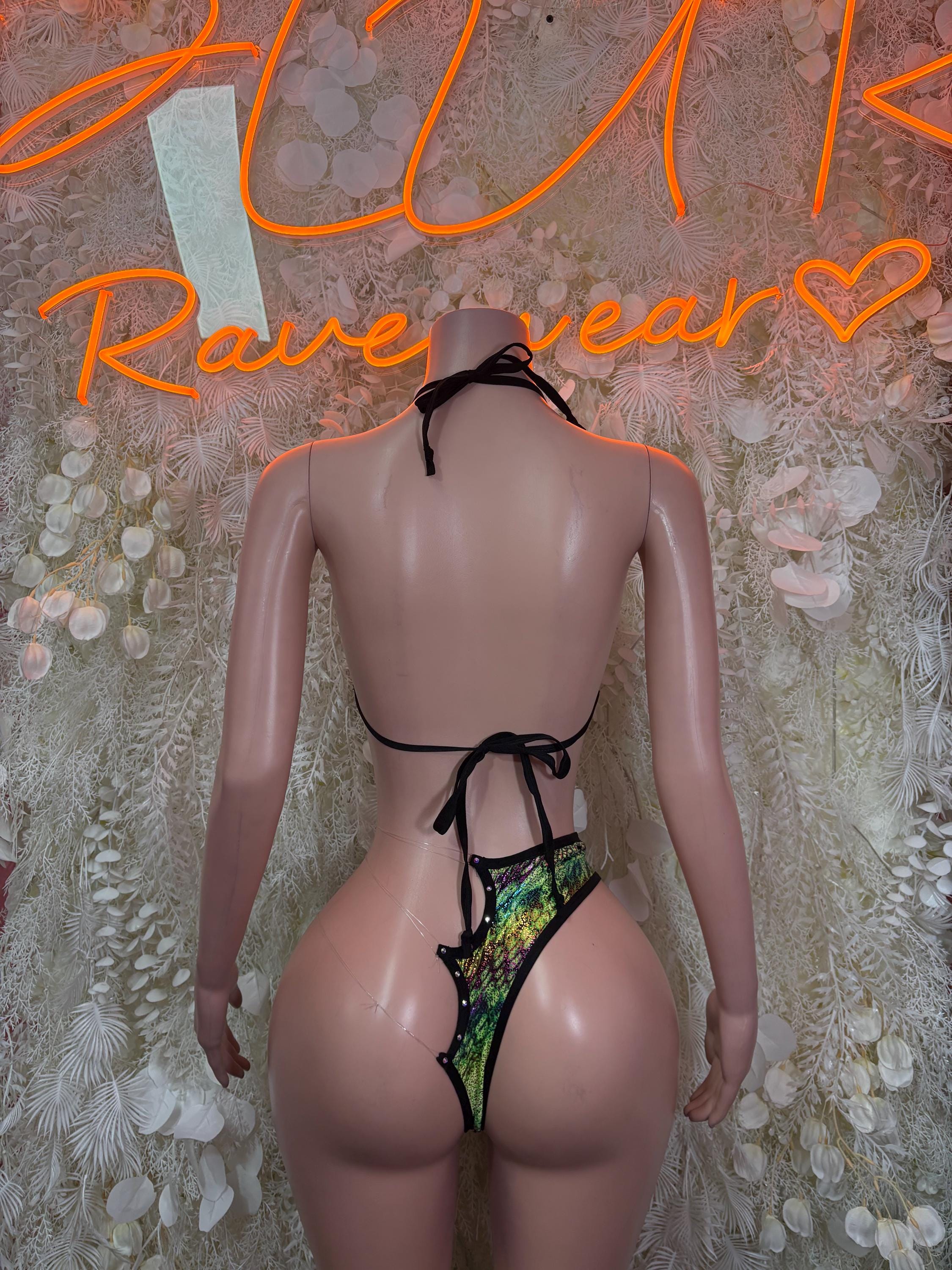 Two-piece bikini back with black string ties and green snake-print thong